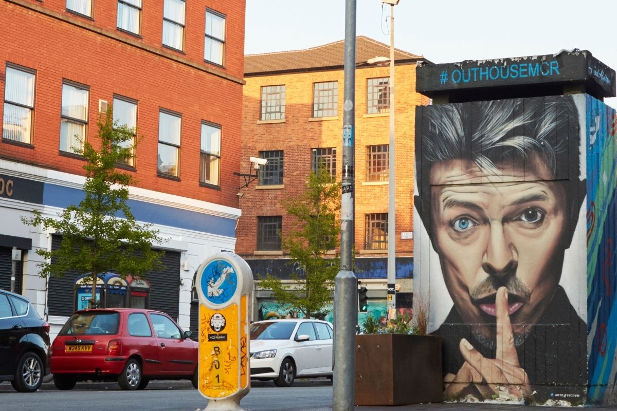 David Bowie Mural painted on the side of a street 