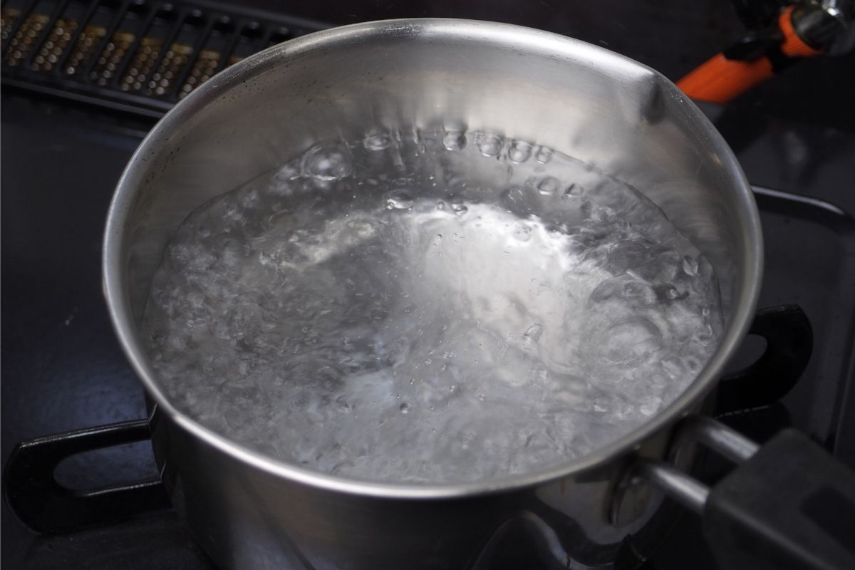 large pot of water boiling on a stove
