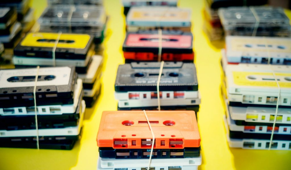 bundles of cassette tapes in the 1980s music era 