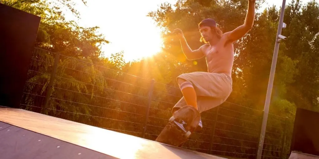 shirtless skater at sunset - nwb