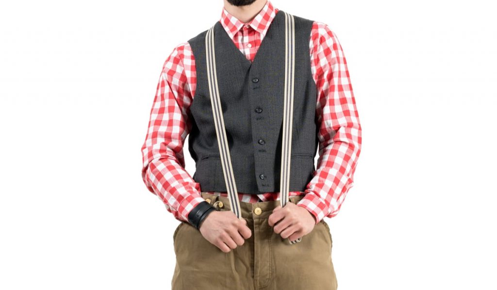 young-man-wearing-suspenders-over-a-black-vest