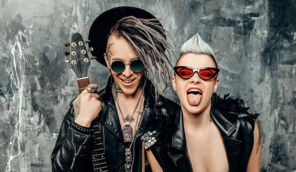 A portrait of two stylish punk people