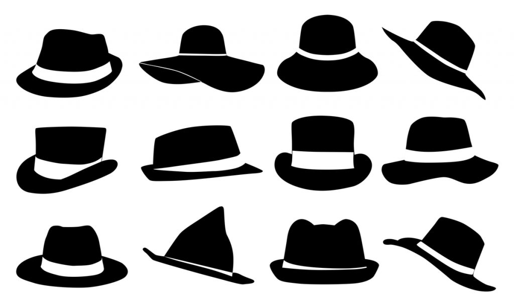  Collection of black hats of different shapes isolated on white background