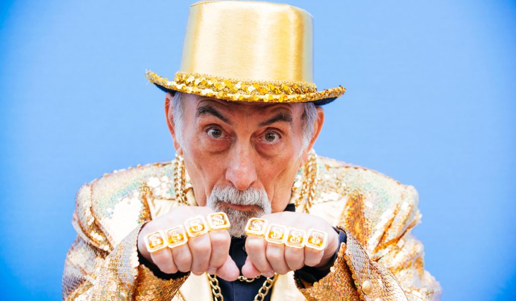 Gangster grandfather with gold outfit and jewelries