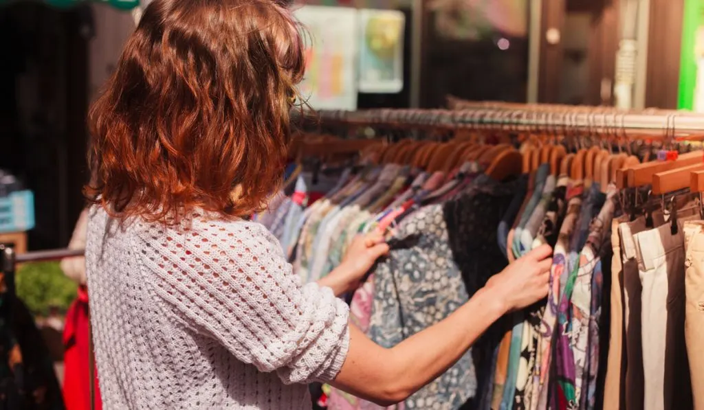 Lady shopping for vintage clothing