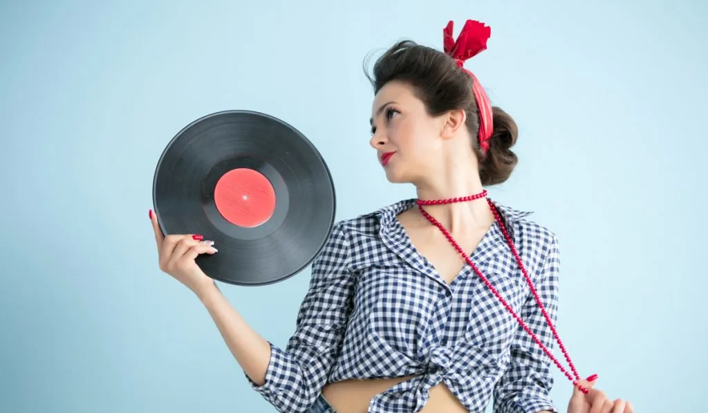 Retro woman with music record