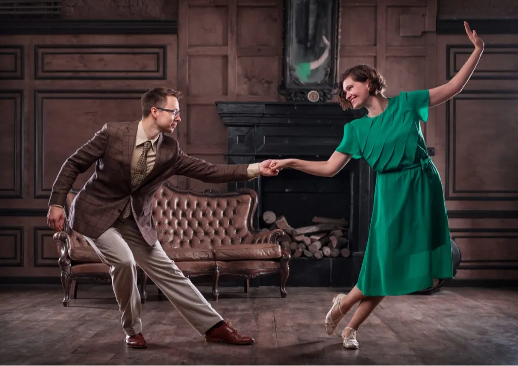 Young Couple Dancing Swing Retro Hall