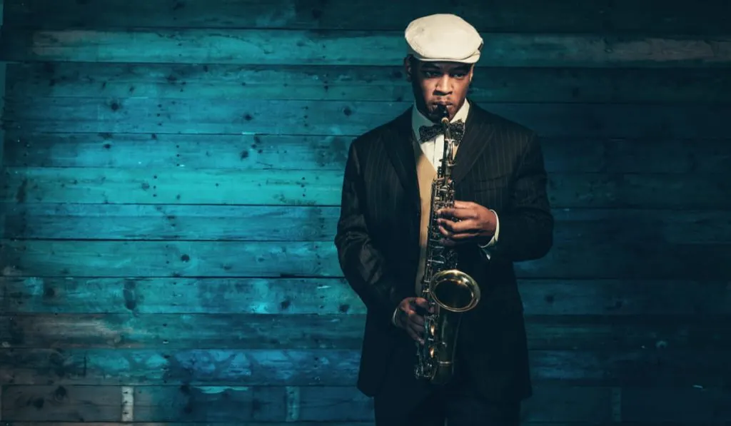 african american man playing saxophone