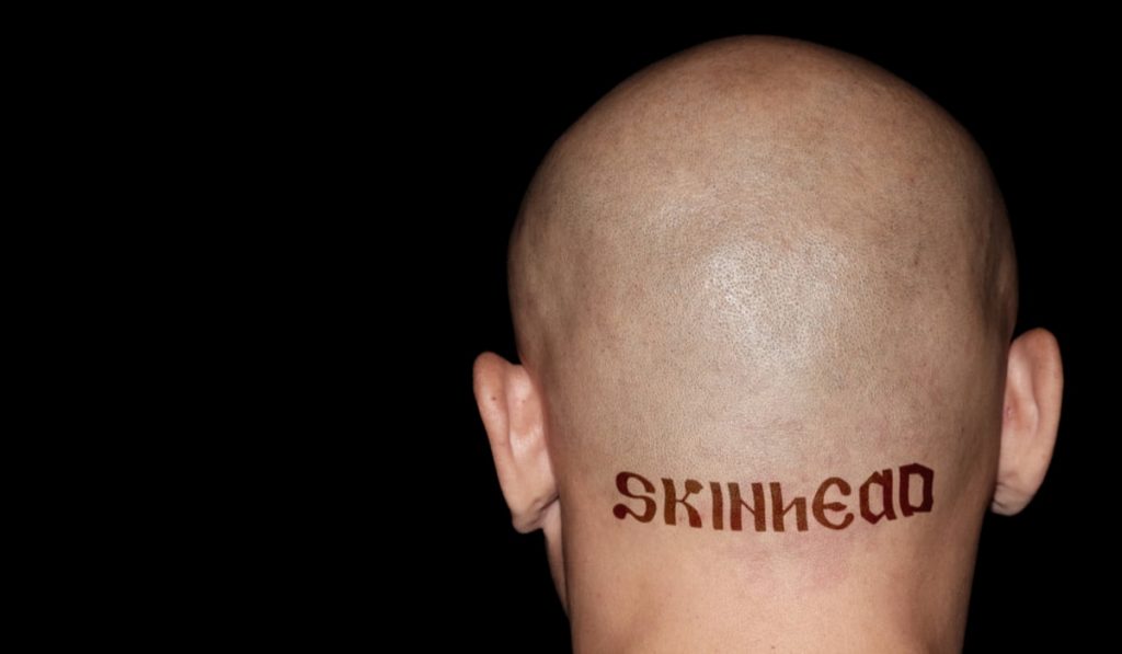 back view of a skinhead man