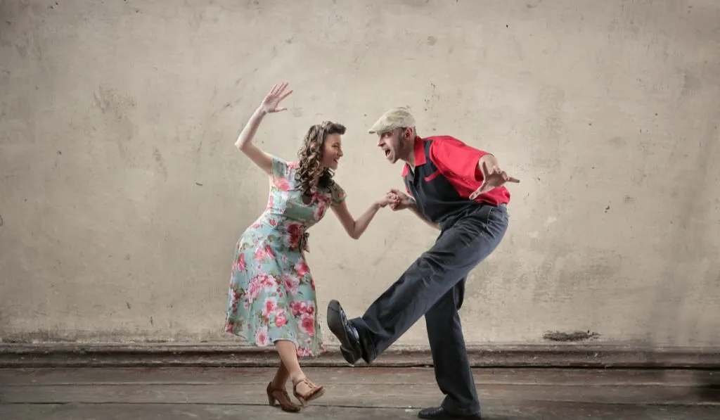 young couple dancing swing